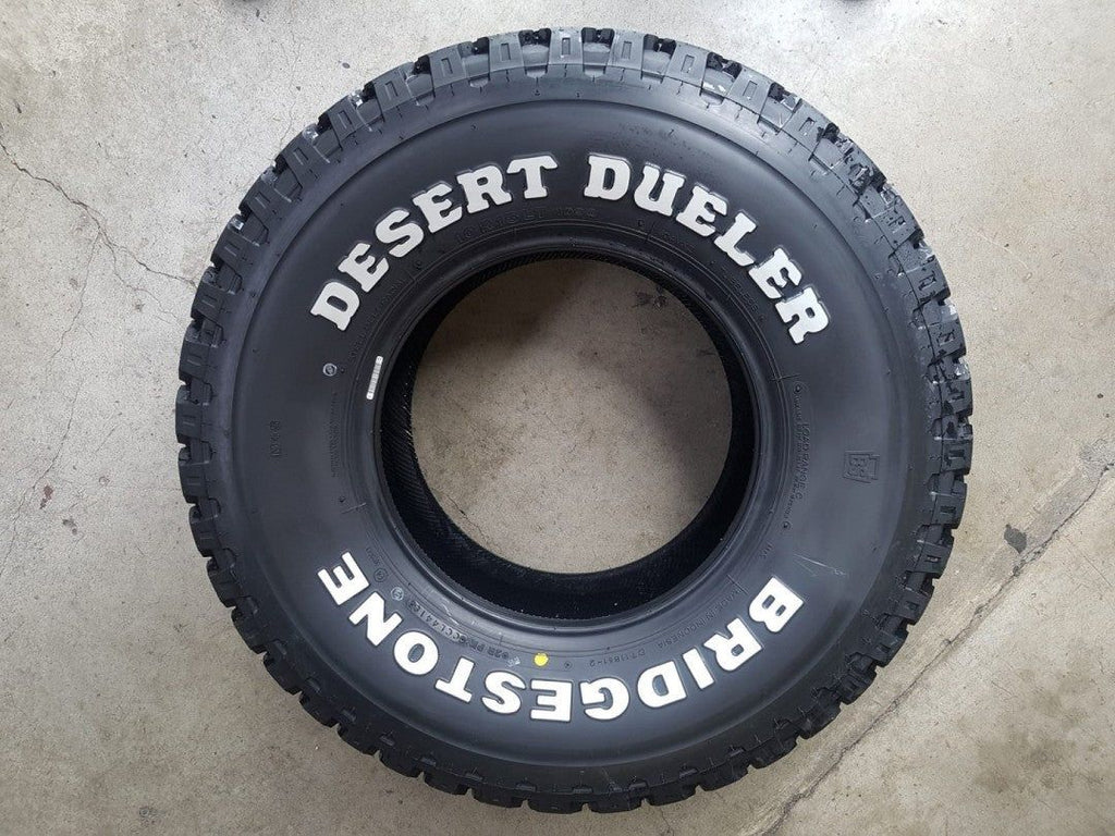 31" 10R15 Bridgestone 604V A/T with Raised White Lettering