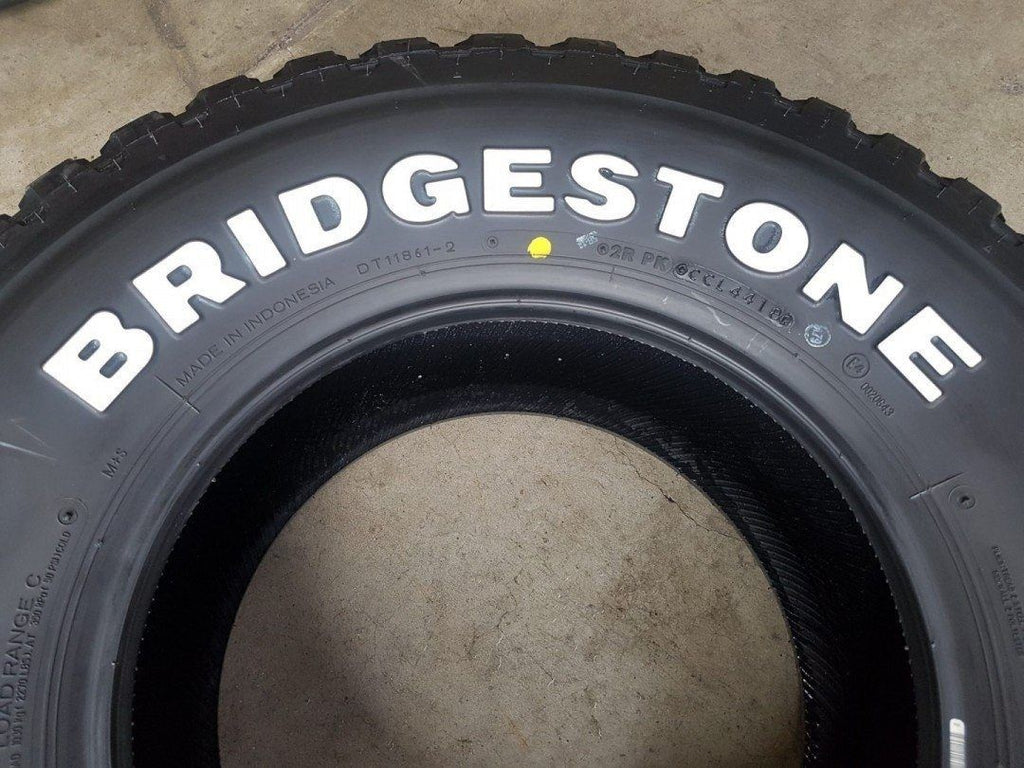 31" 10R15 Bridgestone 604V A/T with Raised White Lettering