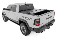 Load image into Gallery viewer, Rough Country Hard Tri-Fold Flip-Up Bed Cover Ram 1500 (19-26) / 1500 TRX (21-24)