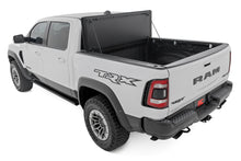 Load image into Gallery viewer, Rough Country Hard Tri-Fold Flip-Up Bed Cover Ram 1500 (19-26) / 1500 TRX (21-24)