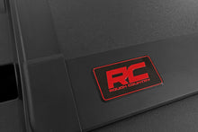 Load image into Gallery viewer, Rough Country Hard Tri-Fold Flip-Up Bed Cover Ram 1500 (19-26) / 1500 TRX (21-24)