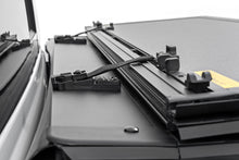 Load image into Gallery viewer, Rough Country Hard Tri-Fold Flip-Up Bed Cover Ram 1500 (19-26) / 1500 TRX (21-24)